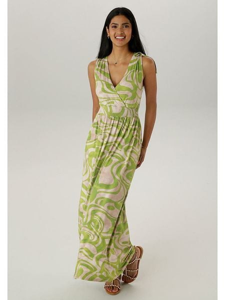 Aniston Sukienka w kolorze beżowo-zielonym rozmiar: 44. Brązowe sukienki Aniston, na co dzień, bez wzorów, bez kołnierzyka, bez ramiączek, maxi, proste. Za 57.20 zł.