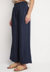 Granatowe Szerokie Spodnie Palazzo z Wysokim Stanem Aranwenna. Niebieskie jeansy Born2be, bez wzorów, z jeansu, eleganckie, z podwyższonym stanem. Za 69.99 zł.
