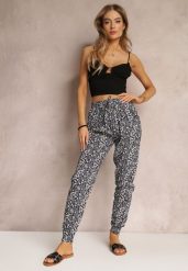 Granatowe Kwieciste Spodnie z Gumką w Talii i Wsuwanym Kieszeniami Aneva. Niebieskie jeansy Renee, s, bez wzorów, z jeansu, długie. W wyprzedaży za 26.99 zł.