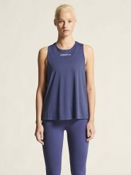 Craft Top sportowy "Core Essence" w kolorze granatowym rozmiar: XS. Niebieskie topy sportowe Craft, xs, bez wzorów, z materiału, outdoorowe. Za 53.17 zł.