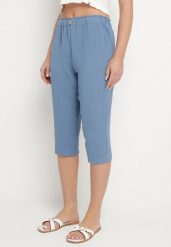 Niebieskie Spodnie Capri z Bawełną i Wysokim Stanem Galirosa. Niebieskie jeansy Born2be, l, bez wzorów, z bawełny, eleganckie, z podwyższonym stanem. Za 59.99 zł.