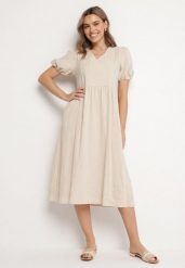 Jasnobeżowa Bawełniana Sukienka Boho o Rozkloszowanym Kroju Zdobiona Haftem Lannivra. Brązowe sukienki Born2be, na co dzień, l, z aplikacjami, z bawełny, boho, bez kołnierzyka, bez ramiączek, midi, rozkloszowane. Za 139.99 zł.
