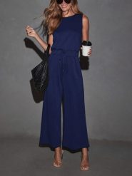 Milan Kiss Kombinezon w kolorze granatowym rozmiar: M. Niebieskie kombinezony Milan Kiss, m, bez wzorów, z wiskozy, bez kołnierzyka, bez ramiączek. Za 206.91 zł.