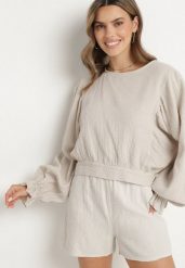 Beżowa Bluzka z Bawełny o Nietoperzowym Kroju z Wiązaniem Sepene. Brązowe bluzki Born2be, z aplikacjami, z bawełny, eleganckie, bez kołnierzyka, bez ramiączek. Za 139.99 zł.