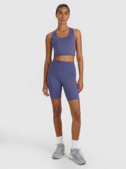 4F Legginsy kolarki treningowe damskie - granatowe S. Niebieskie legginsy 4f, bez wzorów, z dzianiny, sportowe, krótkie. W wyprzedaży za 89.99 zł.