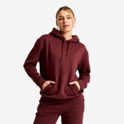 Bluza z kapturem damska Essential. Fioletowe bluzy Decathlon, l, bez wzorów, z materiału, klasyczne, bez ramiączek, z kapturem. Za 89.99 zł.