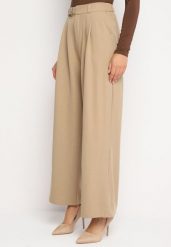 Beżowe Eleganckie Spodnie Garniturowe z Szerokimi Nogawkami i Paskiem Verinella. Brązowe jeansy Born2be, l, z aplikacjami, z jeansu, eleganckie. W wyprzedaży za 118.99 zł.