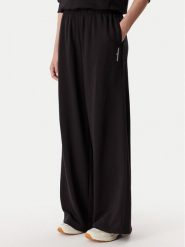 Tommy Jeans Spodnie dresowe DW0DW22951 Czarny Relaxed Fit. Czarne spodnie sportowe Tommy Jeans, bez wzorów, z bawełny. Za 369.99 zł.