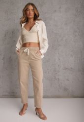 Beżowe Jeansy Mom Fit High Waist z Bawełny ze Ściągaczem w Pasie Phiales. Brązowe jeansy Renee, l, bez wzorów, z bawełny, z podwyższonym stanem, długie. Za 129.99 zł.