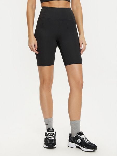 Girlfriend Collective Szorty sportowe 4035 Czarny Slim Fit. Czarne szorty sportowe GIRLFRIEND COLLECTIVE, bez wzorów, z syntetyku, na fitness i siłownię. Za 189.99 zł.