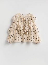 Bluzka w groszki - złamana biel. Bluzki Reserved, l, bez wzorów, z lyocellu, bez kołnierzyka, bez ramiączek. Za 159.99 zł.