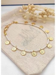 Atelier MIU Bransoletka z perłami syntetycznymi na kostkę - dł. 21 cm rozmiar: onesize. Żółte bransoletki atelier MIU, z perłą, z mosiądzu. Za 26.99 zł.