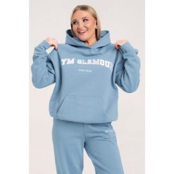 Bluza fitness damska Gym Glamour college sky. Niebieskie bluzy GYM GLAMOUR, xl, bez wzorów, glamour, bez ramiączek, bez kaptura. Za 199.99 zł.