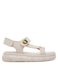 Guess Sandały FLJLAN ELE03 Écru. Sandały Guess, z aplikacjami, ze skóry, bez obcasa, na płaskiej podeszwie, bez zapięcia. Za 329.99 zł.