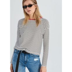 Bluzka w paski - Pomarańczo. Bluzki marki Sinsay. Za 14.99 zł.