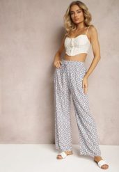 Jasnoniebieskie Szerokie Spodnie z Gumką w Talii z Wiskozy w Mozaikowy Print Wavelette. Niebieskie jeansy Renee, m, bez wzorów, z jeansu, eleganckie, z podwyższonym stanem. W wyprzedaży za 29.99 zł.