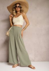 Ciemnozielone Spodnie w Stylu Alladynek High Waist Wykończone Gumką w Pasie Riselma. Zielone jeansy Renee, bez wzorów, z jeansu, sportowe, z podwyższonym stanem. W wyprzedaży za 29.99 zł.