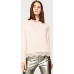Sweter z golfem - Różowy. Swetry marki DOMYOS. W wyprzedaży za 39.99 zł.