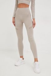 4F legginsy treningowe damskie kolor beżowy gładkie. Brązowe legginsy 4f, bez wzorów. Za 139.99 zł.