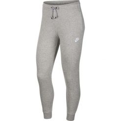 Spodnie sportowe damskie Nike Essential Pant Reg Fleece. Szare spodnie dresowe Nike, bez wzorów, z dresówki, długie. Za 301.00 zł.