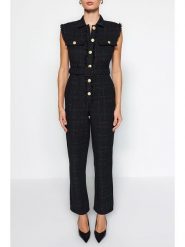 Trendyol Kombinezon w kolorze czarnym rozmiar: 36. Czarne kombinezony Trendyol, bez wzorów, z tkaniny, bez kołnierzyka, bez ramiączek. Za 114.44 zł.