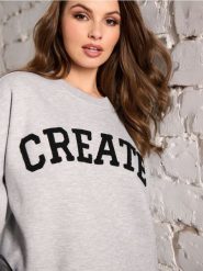 Bluza z napisem - szary. Szare bluzy Sinsay, l, bez wzorów, bez kaptura, do biegania. W wyprzedaży za 35.99 zł.