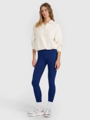 Legginsy fitness damskie z wysokim stanem. Niebieskie legginsy 4f, bez wzorów, z bawełny, sportowe, długie. Za 59.99 zł.