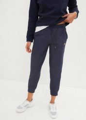 Spodnie dresowe 7/8 o wyglądzie jeansów. Niebieskie jeansy bonprix, bez wzorów, z bawełny. Za 129.99 zł.