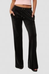 JUICY COUTURE Czarne spodnie dresowe damskie Layla Low Rise. Czarne spodnie dresowe Juicy Couture, bez wzorów, z dresówki. W wyprzedaży za 322.99 zł.