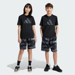 Szorty Train Essentials Seasonal Print Kids. Niebieskie szorty adidas, bez wzorów, z materiału, sportowe. Za 139.00 zł.