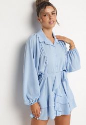 Jasnoniebieska Sukienka Ozdobiona Paskiem i Falbanami Divilena. Niebieskie sukienki Born2be, na co dzień, m, bez wzorów, z jeansu, eleganckie, bez kołnierzyka, bez ramiączek, mini. W wyprzedaży za 76.49 zł.