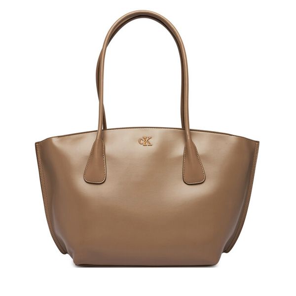Torebka Calvin Klein. Brązowe shopper bag Calvin Klein, bez wzorów, bez dodatków. Za 649.99 zł.