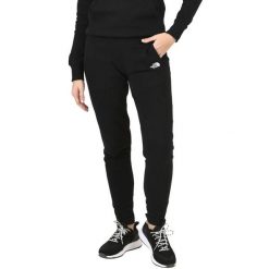Spodnie treningowe damskie The North Face Nse. Czarne spodnie sportowe The North Face, na zimę, bez wzorów, narciarskie. W wyprzedaży za 232.65 zł.