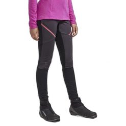 Legginsy damskie Craft Core Glide Wind. Czarne legginsy Craft, bez wzorów, eleganckie. Za 381.85 zł.