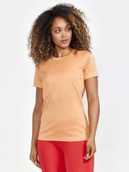 Craft Koszulka sportowa "Core Essence" w kolorze pomarańczowym rozmiar: M. Pomarańczowe t-shirty sportowe Craft, m, bez wzorów, bez ramiączek, outdoorowe. Za 66.16 zł.