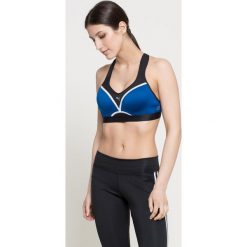 Puma - Biustonosz. Niebieskie biustonosze sportowe Puma, bez wzorów, z elastanu. W wyprzedaży za 59.90 zł.