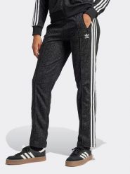 Adidas Spodnie dresowe w kolorze czarnym rozmiar: XS. Czarne spodnie dresowe adidas, bez wzorów, z dresówki. Za 202.95 zł.