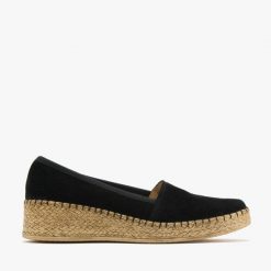 Czarne espadryle na platformie SUZI. Czarne espadryle Ryłko, bez wzorów, ze skóry, bez obcasa, na platformie. Za 329.99 zł.