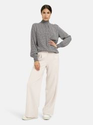 Milano Italy Bluzka w kolorze biało-czarnym rozmiar: 46. Białe bluzki Milano Italy, bez wzorów, z wiskozy, bez kołnierzyka, bez ramiączek. Za 173.99 zł.