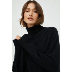 Calvin Klein sweter damski kolor czarny z golfem. Czarne swetry Calvin Klein, l, bez wzorów, z kaszmiru, bez ramiączek. Za 1,199.90 zł.