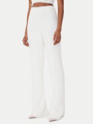 Guess Spodnie dzianinowe O5BB03 Z1282 Écru Flare Fit. Spodnie materiałowe Guess, z aplikacjami, z dzianiny. Za 299.99 zł.