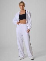 4F Spodnie kibica z szerokimi nogawkami damskie - białe L. Białe spodnie dresowe 4f, bez wzorów, z dresówki. Za 159.99 zł.
