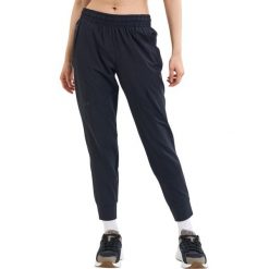 Spodnie sportowe damskie Under Armour Unstoppable Jogger. Czarne spodnie dresowe Under Armour, bez wzorów, z dresówki. Za 321.00 zł.