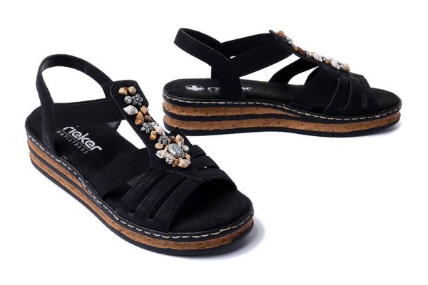 RIEKER 62949-00 black, sandały damskie. Czarne sandały Rieker, bez wzorów, bez obcasa, na koturnie, bez zapięcia. Za 299.90 zł.