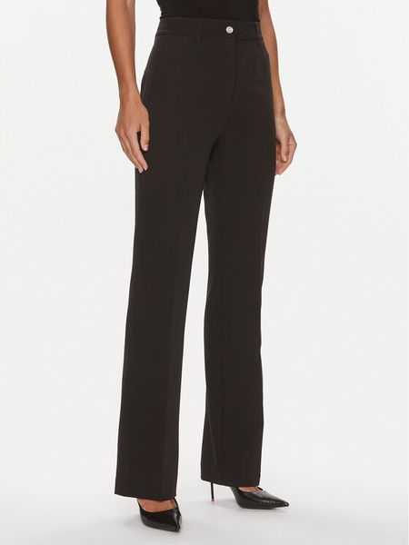 Guess Spodnie materiałowe W4RB30 WFWX2 Czarny Slim Fit. Czarne spodnie materiałowe Guess, z aplikacjami, z materiału. Za 349.99 zł.