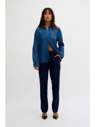 My Essential Wardrobe Spodnie w kolorze granatowym rozmiar: 46. Niebieskie spodnie materiałowe My Essential Wardrobe, bez wzorów, z materiału. Za 105.63 zł.