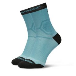 Skarpety wysokie unisex Dynafit. Niebieskie skarpetki Dynafit, bez wzorów. Za 79.99 zł.