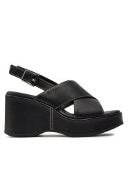 Clarks Sandały Manon Wish 26176299 Czarny. Czarne sandały Clarks, bez wzorów, ze skóry, bez obcasa, na koturnie, bez zapięcia. Za 539.99 zł.