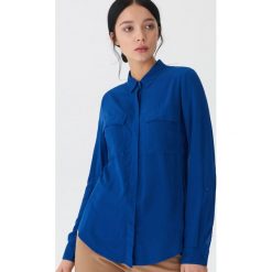 Gładka koszula - Niebieski. Koszule marki QUECHUA. Za 59.99 zł.