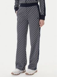 Guess Spodnie dresowe V6RB09 K2042 Granatowy Wide Leg. Niebieskie spodnie dresowe Guess, z aplikacjami, z dresówki. Za 479.99 zł.